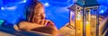 BANNER, LONG FORMAT Portrait of young carefree happy smiling woman relaxing at hot tub at night during enjoying happy Royalty Free Stock Photo