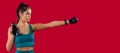 Banner- long format on red background. Profile photo of sportswoman with dumbbell fit slim abs body. Sexy body, fitness