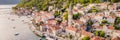 BANNER, LONG FORMAT Scenic panorama view of the historic town of Perast at famous Bay of Kotor with blooming flowers on Royalty Free Stock Photo