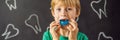 BANNER, LONG FORMAT Six-year old boy shows myofunctional trainer. Helps equalize the growing teeth and correct bite Royalty Free Stock Photo