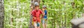 BANNER, LONG FORMAT Two boys in a helmet, healthy teenager school boy enjoying activity in a climbing adventure park on Royalty Free Stock Photo