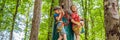 BANNER, LONG FORMAT Two boys in a helmet, healthy teenager school boy enjoying activity in a climbing adventure park on Royalty Free Stock Photo