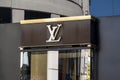 The banner of Louis Vuitton with the logo of the comapy above its storefront