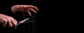 Banner with man cutting strings on hands with scissors. Abuse, violence, slavery cessation. Overcoming addiction and Royalty Free Stock Photo