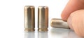 Banner 9mm bullets on white background with hand Royalty Free Stock Photo