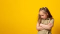 Banner. Angry little girl crossing arms on her chest, pouting lips, having offended facial expression, being capricious. Copy spac Royalty Free Stock Photo