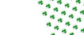 Banner with pattern Shamrocks made of green glass hearts on white background
