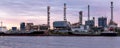 Banner of petroleum oil refinery plant beside river in twilight time