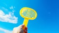 banner pickleball game, hands over blue sky hitting pickleball yellow ball Royalty Free Stock Photo