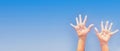 Banner of positive symbol drawing by sunscreen (sun cream, suntan lotion) on two Caucasians open hands o. Royalty Free Stock Photo