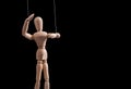 Banner with puppet on strings. Manipulation, control, abusive relationship or addiction concept. Marionette in human Royalty Free Stock Photo