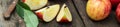 Banner of Red apple sliced and knife on old wooden table Royalty Free Stock Photo
