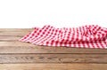 Banner of Red Checkered tablecloth top view  on white background. Brown wooden table. Selective focus. Copy space. Place Royalty Free Stock Photo