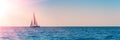 Banner 3:1. Sailboat in the sea in the evening sunlight over sky background. Luxury summer adventure or active vacation concept. Royalty Free Stock Photo