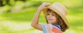 Banner with spring child face. Portrait of cheerful child in summer nature park. Cute joyful little boy kid. Close up Royalty Free Stock Photo