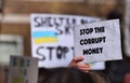 A banner that reads Ã¢â¬ÅStop the Corrupt MoneyÃ¢â¬Â at Stand with Ukraine protests in London on February 26 2022