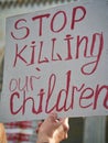 Banner Stop Killing Our Children. Demonstration No war in Ukraine. No war, stop war, stop russian aggression