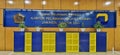 Banner from the tax office in Jakarta with a wooden background and blue and yellow cabinets. Royalty Free Stock Photo