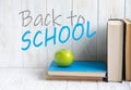 Banner on the theme of the school. Welcome back to school. Themed banner with educational supplies and books