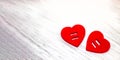 Banner. Two red felt hearts next to each other on a white wooden background. Valentine`s day. concept of love. Copy Royalty Free Stock Photo