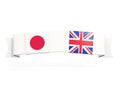 Banner with two square flags of Japan and United Kingdom