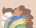 Banner with a Ukrainian girl hugging the planet, sad. A young woman mourns for the Ukrainian land. The concept of