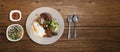 Banner of Vietnamese broken rice with grilled pork chop, fried egg and meatloaf Royalty Free Stock Photo