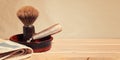 Banner with vintage shaving equipment, razor blade and brush on the table Royalty Free Stock Photo