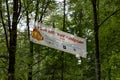 Banner for warning of forest fire with advice to avoid open fire and contact information