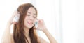 Banner website beautiful portrait asian young woman happy enjoy and fun listen music with headphone Royalty Free Stock Photo