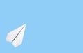 Banner with white origami plane on blue background. Symbol of starting all over. Place for text Royalty Free Stock Photo