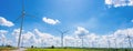 Banner Wind turbine renewable energy source summer with blue sky