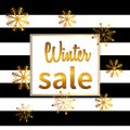 Banner winter sale. Lettering design with shining gold glittering snowflakes Royalty Free Stock Photo