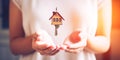 Banner with woman hands and house key close-up for advertising of purchase,rental apartment,house. Concept for