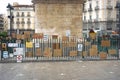 Banners left on the fence of the statue of Carlos III in the `Puerta del Sol`