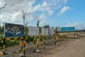 Banners with a plan of the area and the racing circuit. Construction of a complex on the Motogp Mandalika circuit, West Nusa