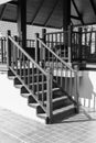 Bannister shadow on wooden stair step Royalty Free Stock Photo