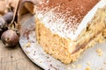 Banoffee pie on wooden table in soft light