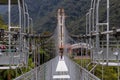 Group of people on suspension bridge, Ecuador Royalty Free Stock Photo