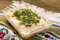 Banosh Hutsul cuisine. Corn porridge with cream, sheep cheese