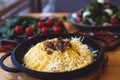 Banosh, a traditional Ukrainian corn grain dish with fat and sheep cheese. style rustic.