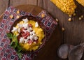 Banosh - Ukrainian Hutsul meal maize porridge with bacon cracklings and cheese