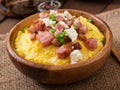 Banosh - Ukrainian Hutsul meal (maize porridge) with bacon Royalty Free Stock Photo