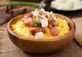 Banosh - Ukrainian Hutsul meal (maize porridge) with bacon Royalty Free Stock Photo