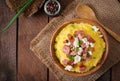 Banosh - Ukrainian Hutsul meal (maize porridge) with bacon Royalty Free Stock Photo