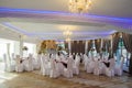The banquet hall with round tables