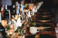 Banquet or holiday background in a rustic atmosphere.  Dinner table setting. Vintage decoration of reception table. Elegant Royalty Free Stock Photo