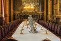 Banquet table in the apartments of Napoleon III in Louvre Museum in Paris, France with luxury baroque furnishings and stunning