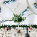 Banquet table is decorated with compositions of hydrangea flowers