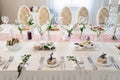 Banquet wedding table in a restaurant or cafe in beige and brown colors Royalty Free Stock Photo